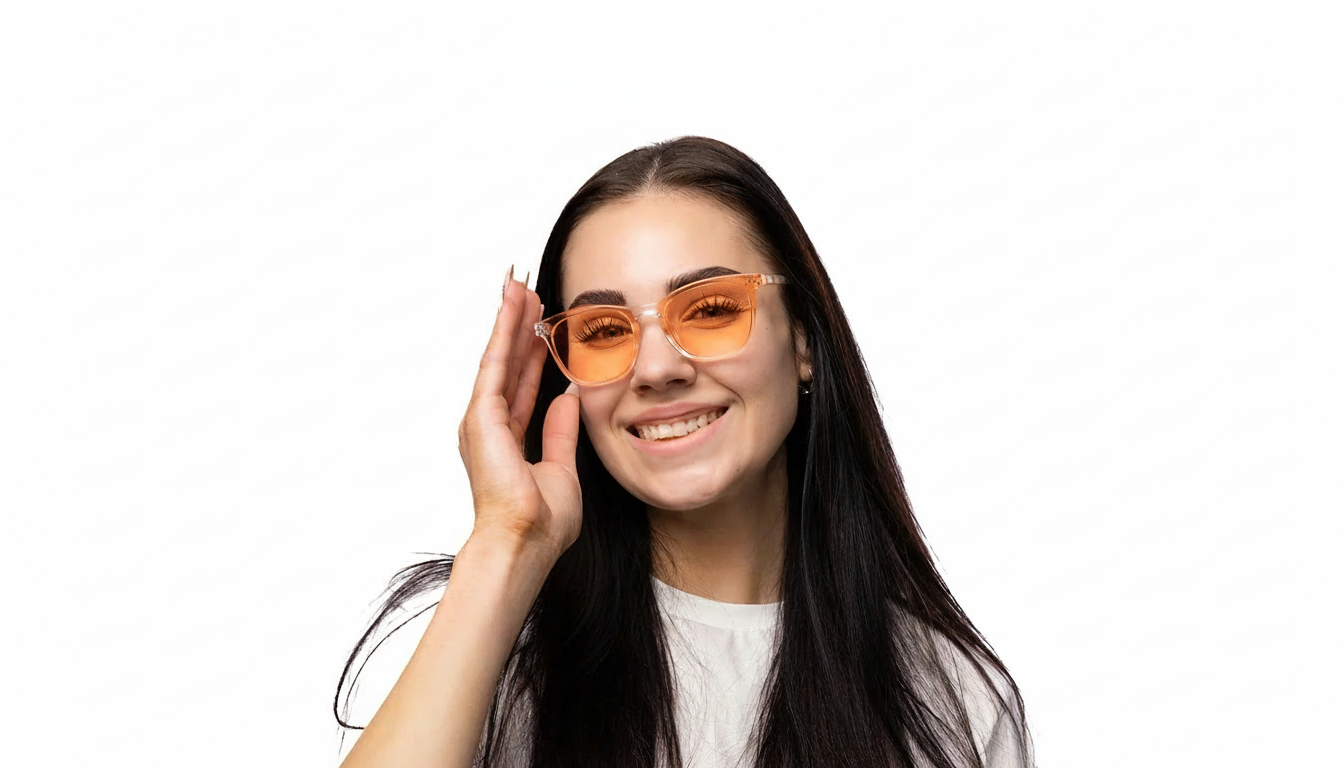 Kvinna med orangea glasögonlinser